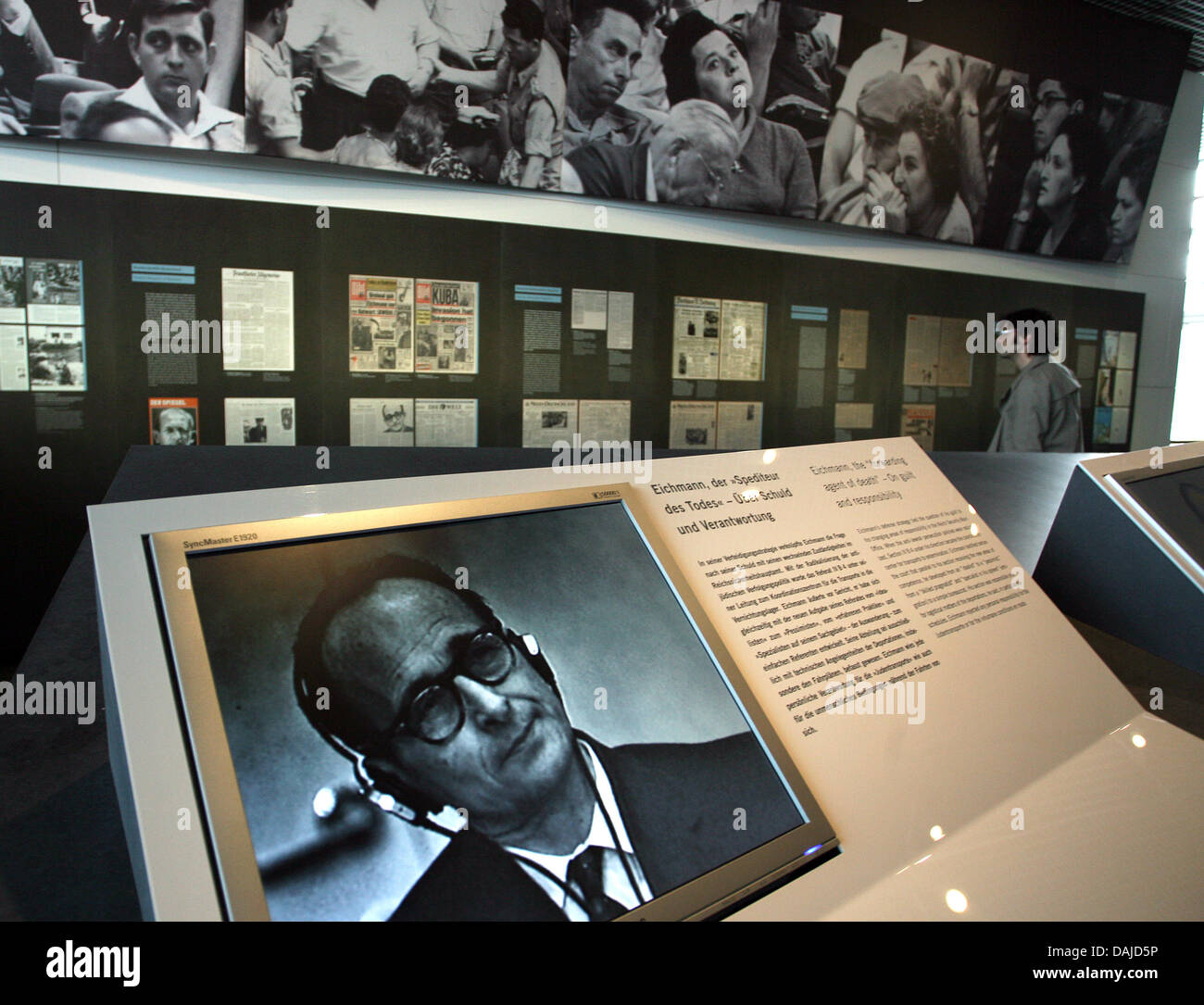 A visitor walks through the exhibition 'Facing Justice - Adolf Eichmann on trial (Der Prozess - Adolf Eichmann vor Gericht) in Berlin, Germany, 5 April 2011. The exhibition, which documents the trial against Nazi criminal Adolf Eichmann in 1961, will open at the 'Topography of Terror' foundation in Berlin on 6 April 2011. Photo: Stephanie Pilick Stock Photo