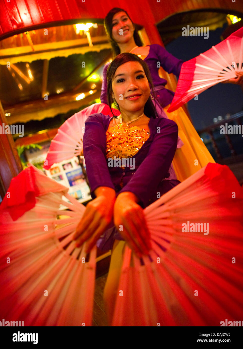 The two Vietnamese dancers Nguyet (front) and Mai perform a traditional ...