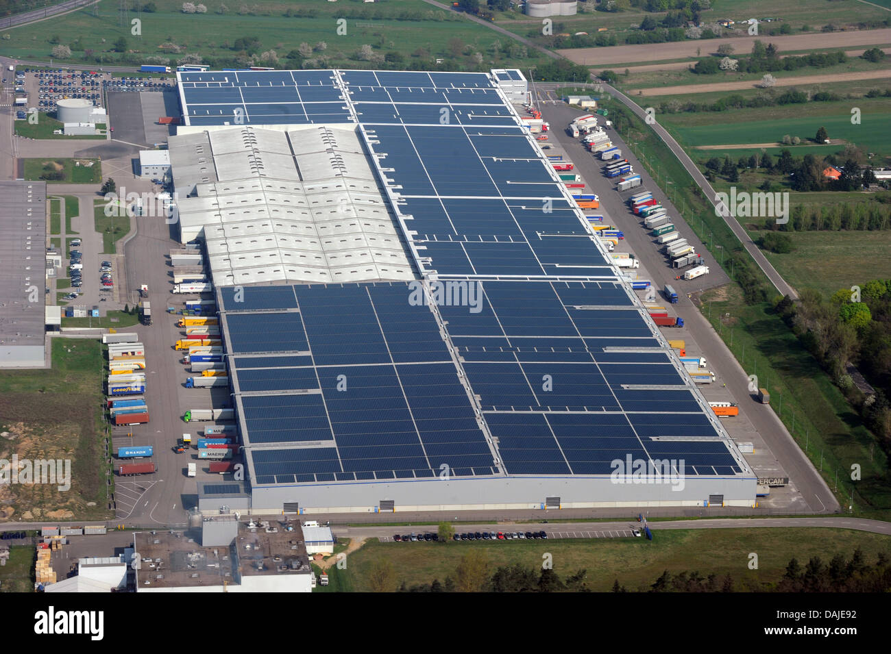 The aerial view shows the biggest solar panelled roof on a industrial  building in Philippsburg, Germany, 8 April 2011. The solar system belongs  to logistics centre of Goodyear Dunlop. It has a
