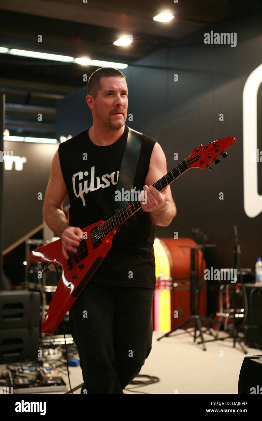 Canadian guitarist Jeff Waters of the Canadian trash metal band Annihilator  performs on his 'Flying V' guitar for music instruments manufacturer Gibson  during the 2011 Music Fair in Frankfurt, Germany, 6 April