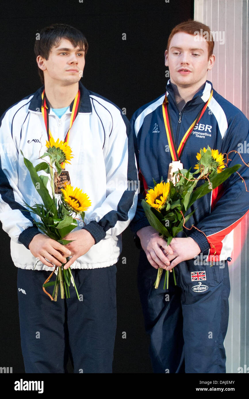 Third placed Ukrainian athlete Mykola Kuksenkov (L) and Daniel Purvis