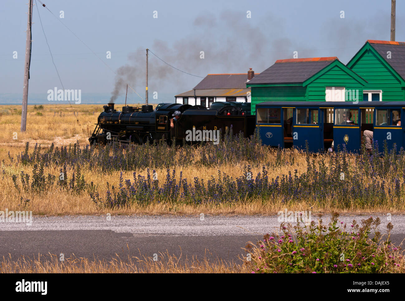 Romney Hythe and Dymchurch Miniature Steam Railway Locomotive Train Doctor Syn at Dungeness Kent UK Stock Photo