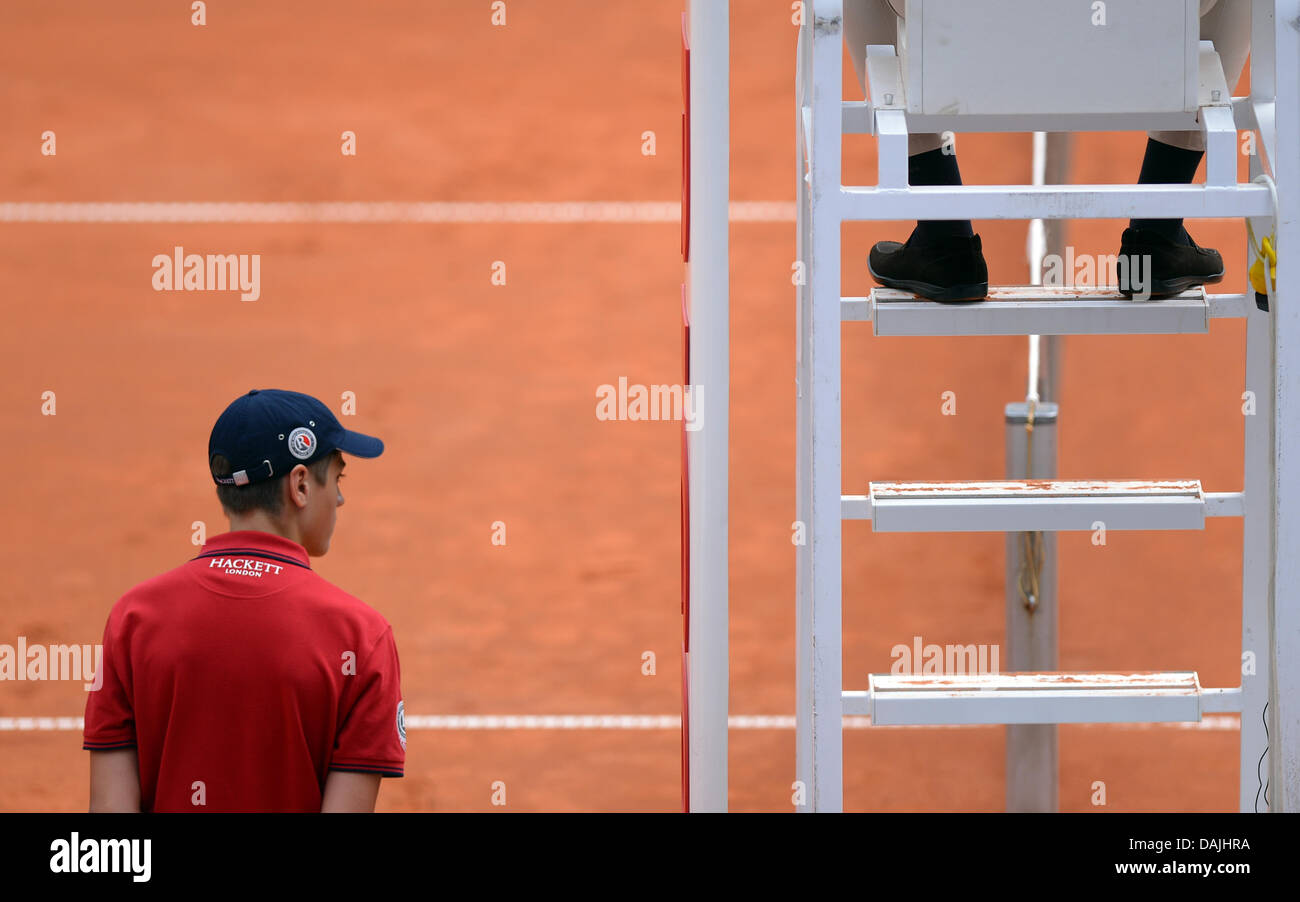 A ballboy looks in the direction of the referee's chair during the ATP