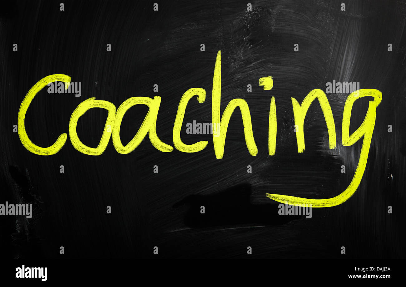 Coaching handwritten with white chalk on a blackboard Stock Photo - Alamy