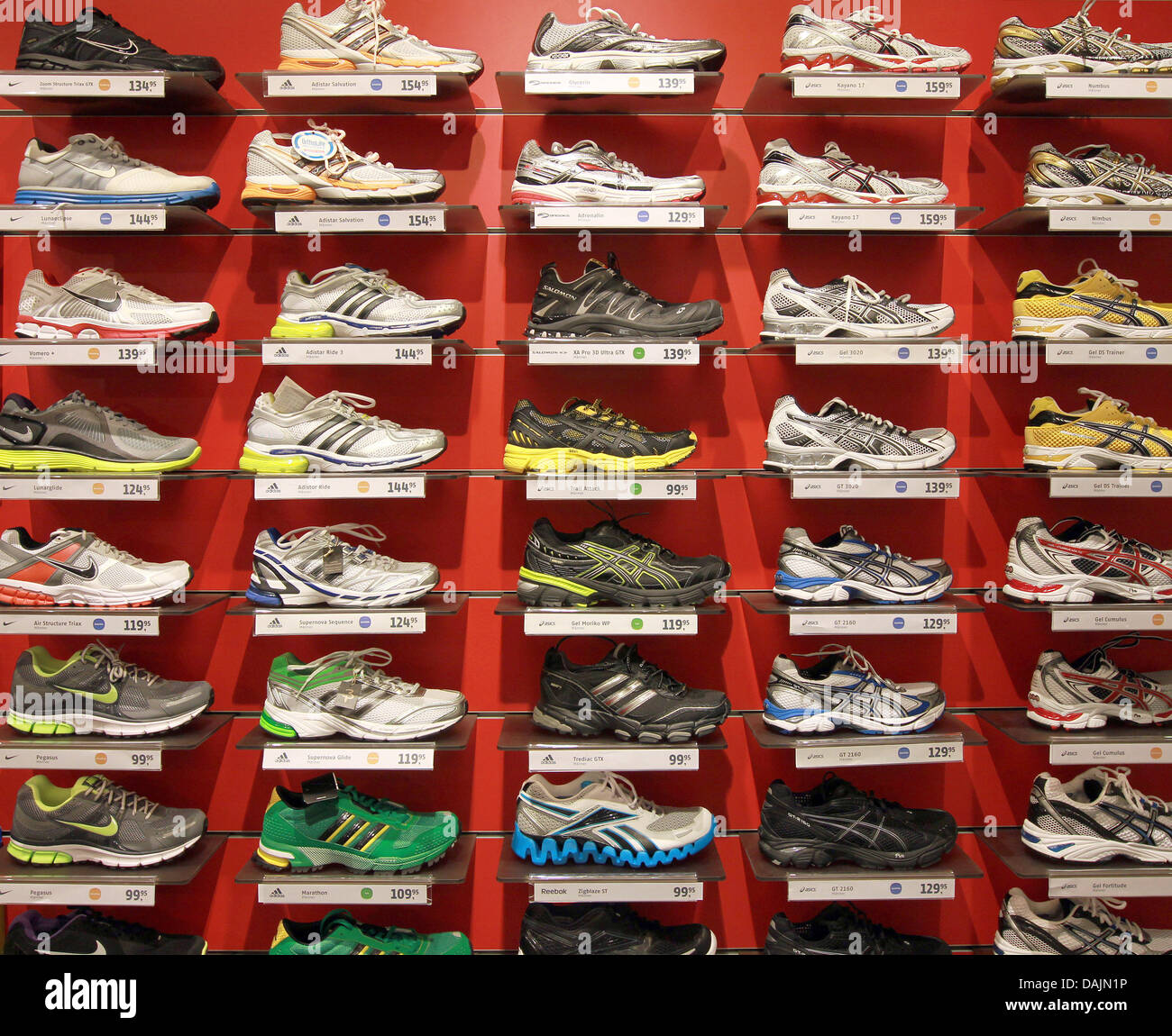 Sports shoes are on display at a shoe shop in Magdeburg, Germany, 30 ...
