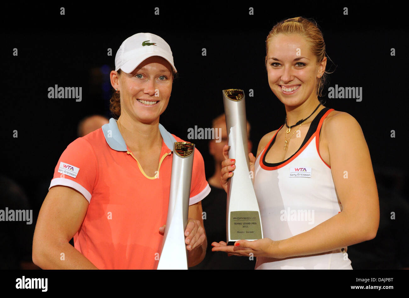 Australia's Samantha Stosur (L) and Sabine Lisicki from Germany hold their trophy after the WTA tournament doubles final at the Porsche-Arena in Stuttgart, Germany, 24 April 2011. Stosur and Lisicki won 6:1 and 7:6. Photo: Marijan Murat Stock Photo