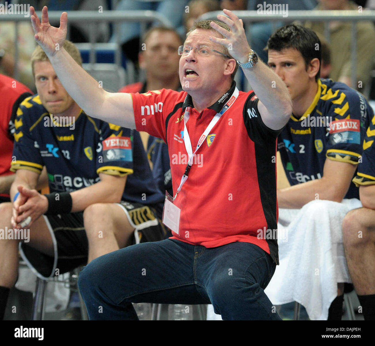 Lions coach Gudmundur Gudmundsson gestures on the sideline during the handball Champions League quarter final first leg match between Rhine-Neckar-Lions and Montpellier HB at SAP Arena in Mannheim, Germany, 24 April 2011. The Lions lost 27:29. Photo: Ronald Wittek Stock Photo