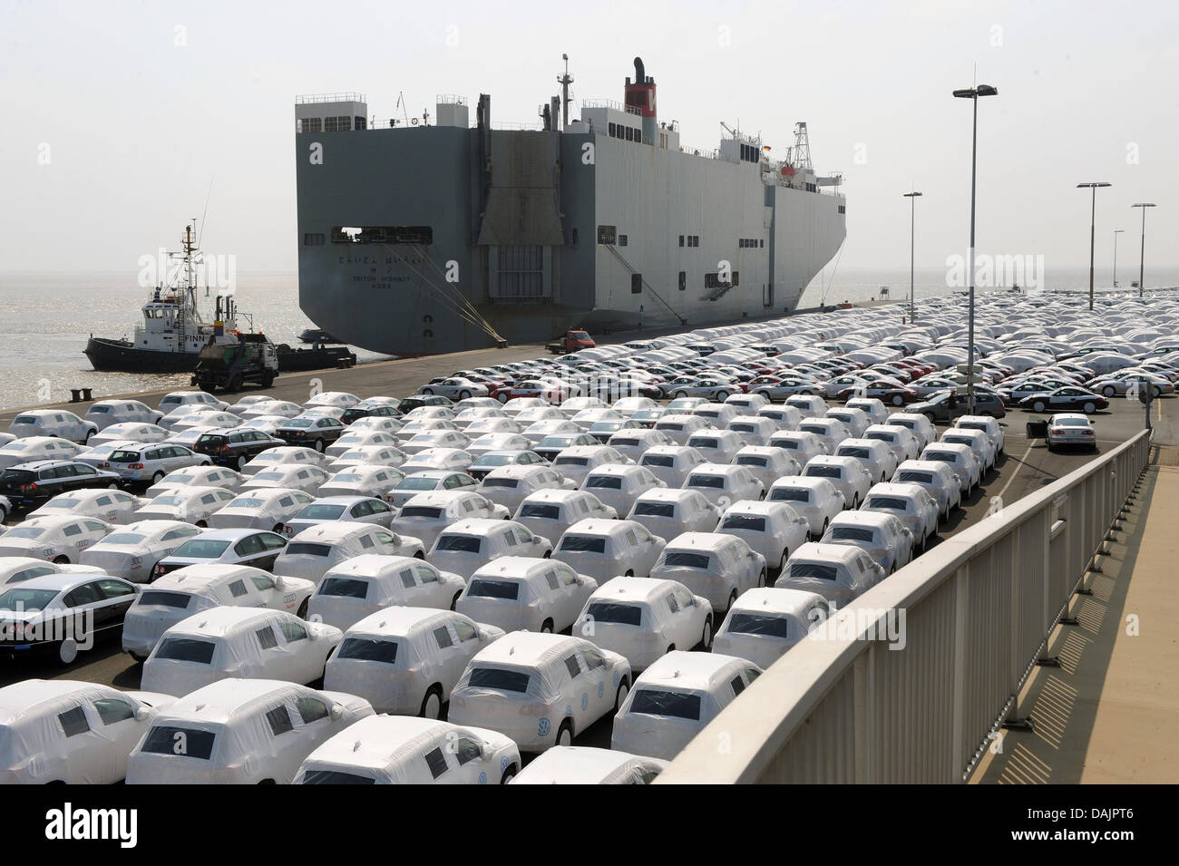 A file picture dated 24 April 2009 shows new Volkswagen cars before shipping at the plant in Emden, Germany. Europe's biggest car company VW had a record sales rate in the first three months of 2011. Volkswagen sold more cars than any other year before in the first three months. Compared to the first quarter of 2010, a worldwide 13,7 per cent more were sold this year. Photo: Ingo W Stock Photo