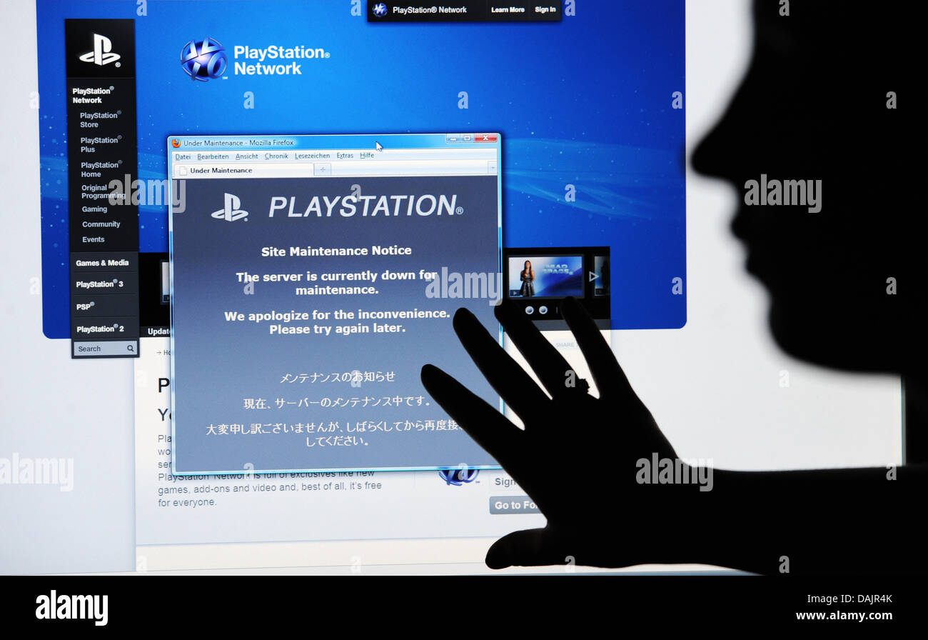 A woman looks at a web page of Sony PlayStation Network which indicates  that the server is curreretly down for maintenance in Hanover, Germany, 27  April 2011. Hacker have managed to get