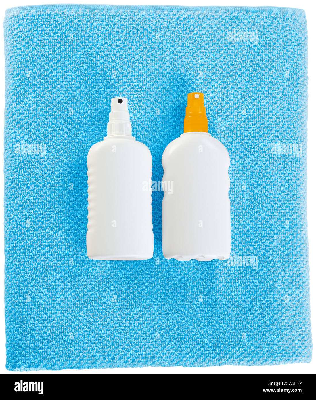 Sunscreen sprays with beach towel on white backgound Stock Photo