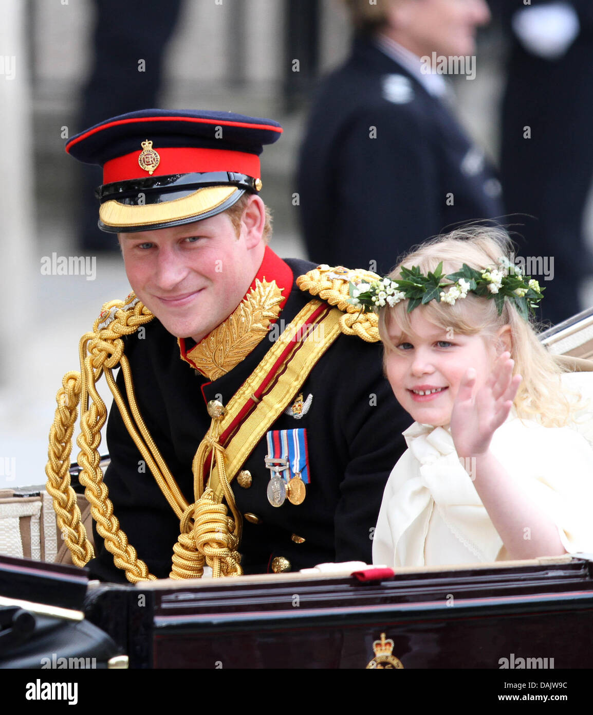 Prince Harry and Lady Louise Windsor ride in a horse-drawn carriage from Westminster Abbey to Buckingham Palace in London, Britain, 29 April 2011, after the wedding ceremony of Prince William and Kate Middleton. Some 1,900 guests followed the royal marriage ceremony of Prince William and Kate Middleton in the church. Photo: Albert Nieboer NETHERLANDS OUT Stock Photo