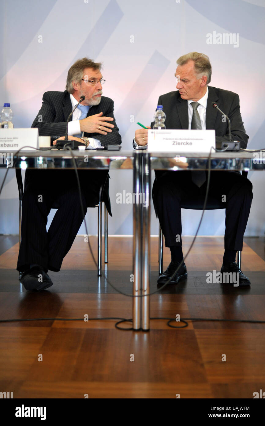 Assistant Federal Attorney General Rainer Griesbaum (L) and the ...
