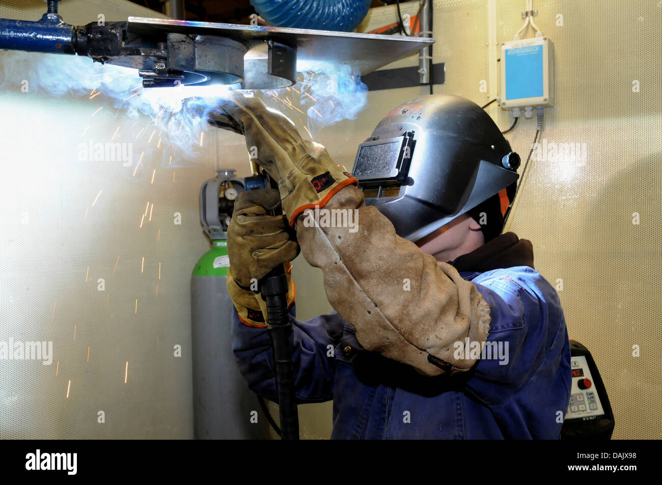 Man welding at a vocational school Stock Photo