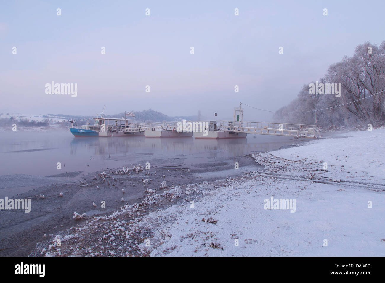 Ferry pier on a winter morning on the Elbe river Stock Photo