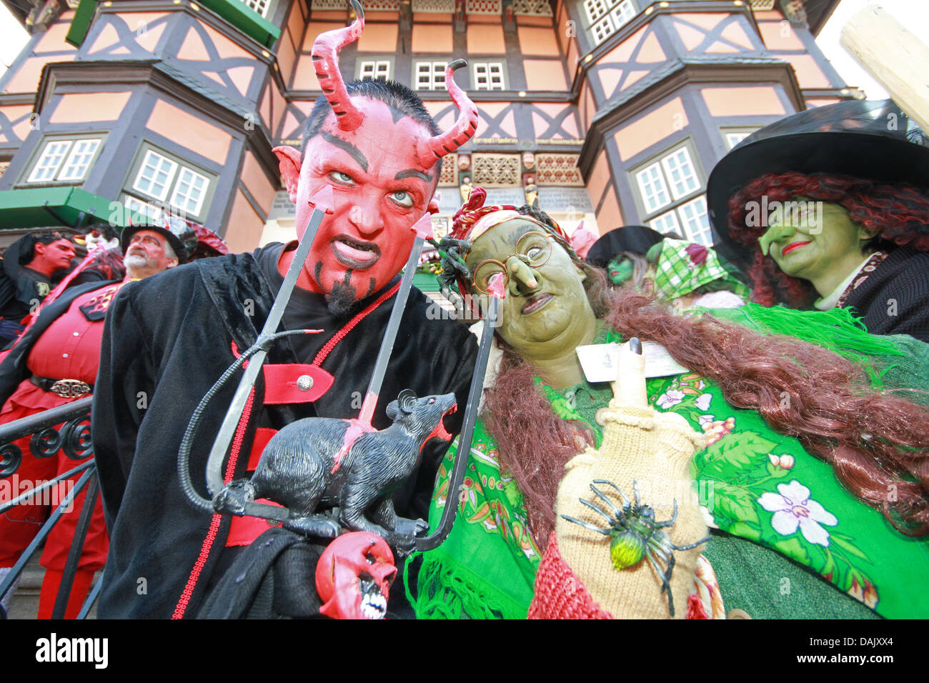 Participants dressed in witch and devil costumes celebrate the Walpurgis festival in Wernigerode, Germany, 20 April 2011. The night of 30 April is famous worldwide, because of Johann Wolfgang Goethe's classic 'Faust', where he describes how witches ride around brooms or billy goats to have orgies with the devil. Photo: Matthias Bein Stock Photo