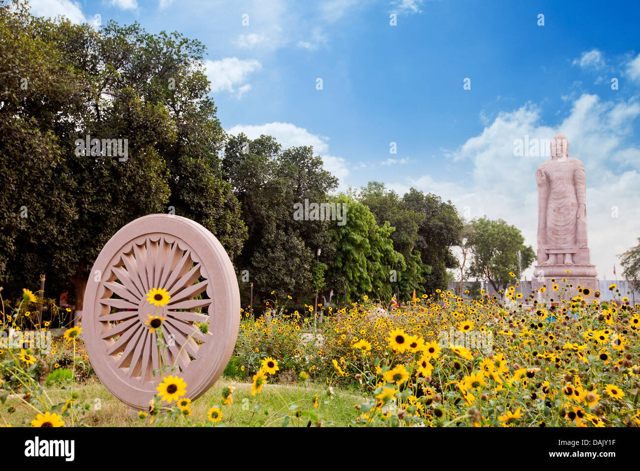 Ashoka chakra and Buddha sculpture at a temple, Thai Temple, Shravasti