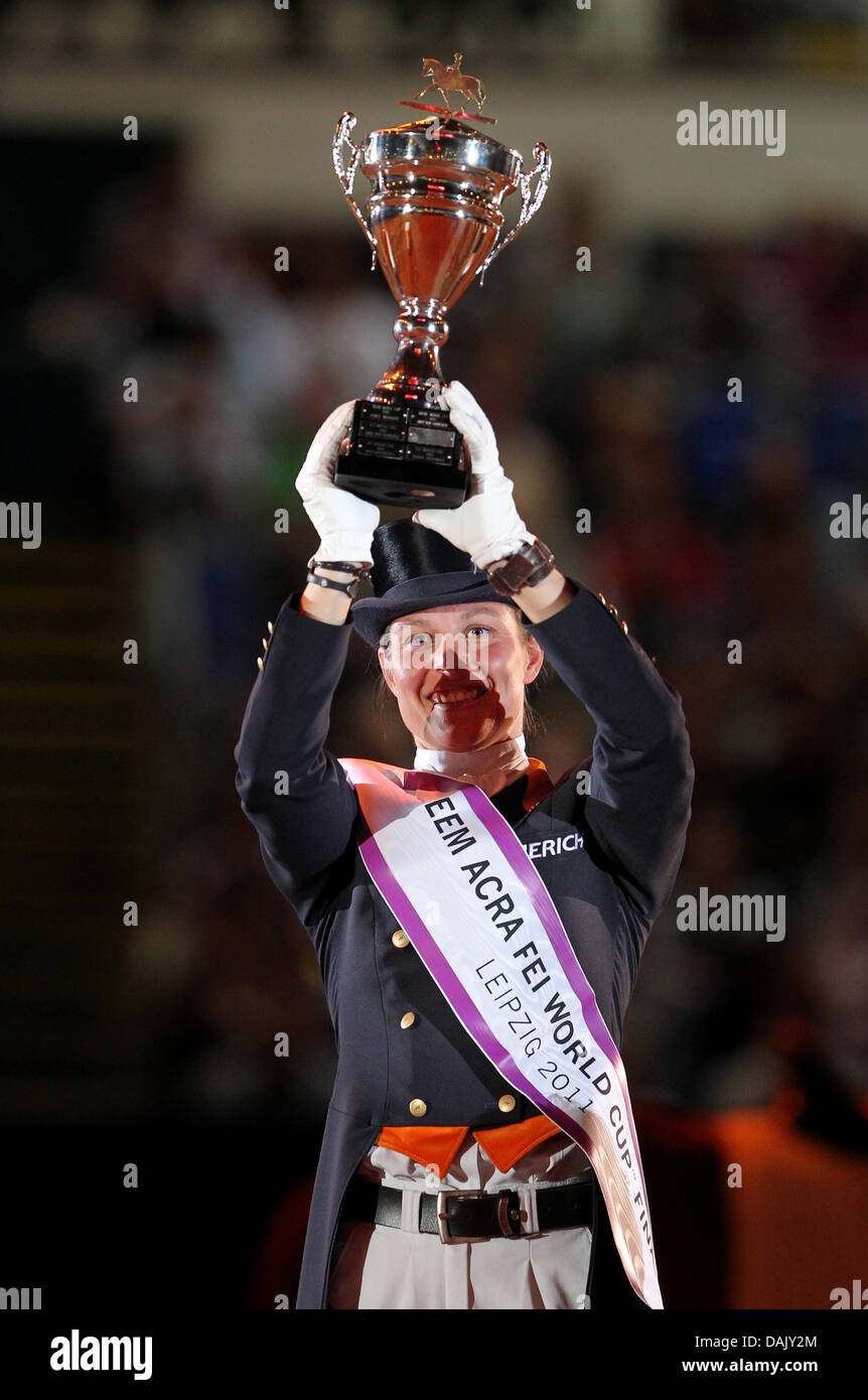 Dutch rider Adelinde Cornelissen celebrates her victory during the Reem Acra FEI Dressage World Cup Finale at the Neue Messe fairgrounds in Leipzig, Germany, 20 April 2011. Photo: Jan Woitas Stock Photo