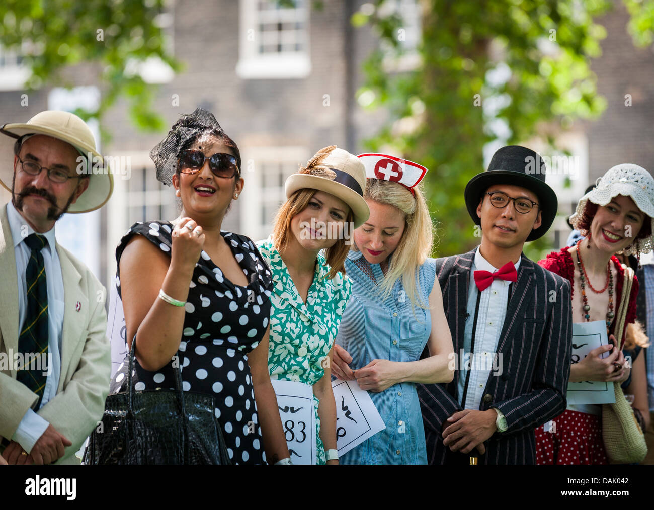 Contestants in the Chaps Olympiad in Bedford Square Gardens. Stock Photo