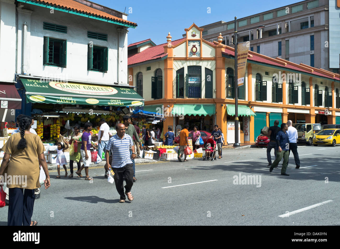 dh  LITTLE INDIA SINGAPORE Indian grocers shop people walking across road Stock Photo
