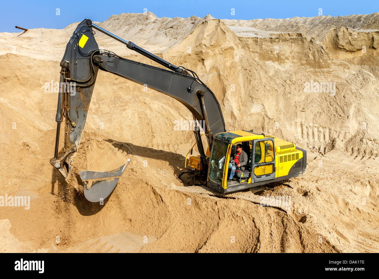 Yellow Excavator work at Construction Site Stock Photo - Alamy