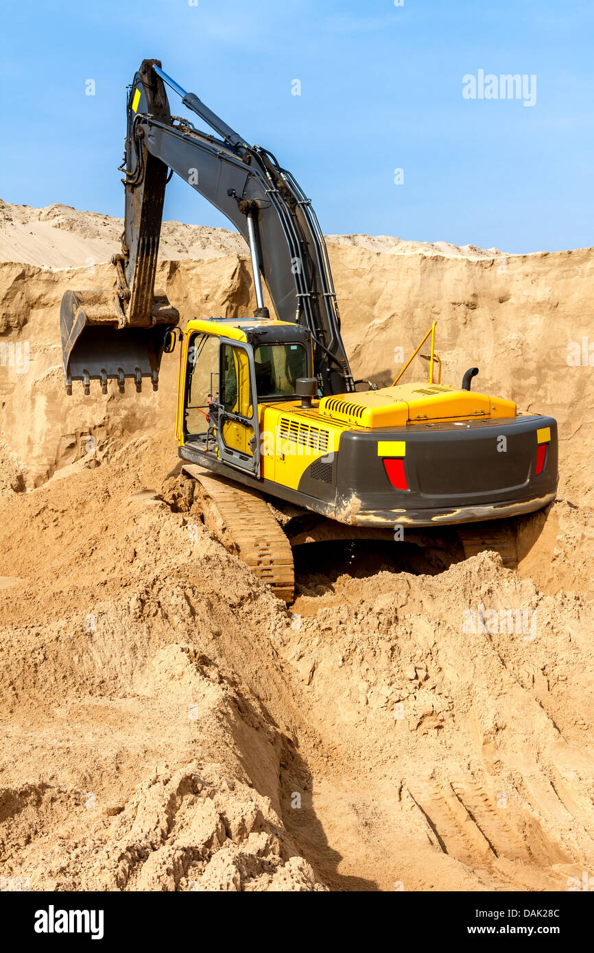 Yellow Excavator work at Construction Site Stock Photo - Alamy