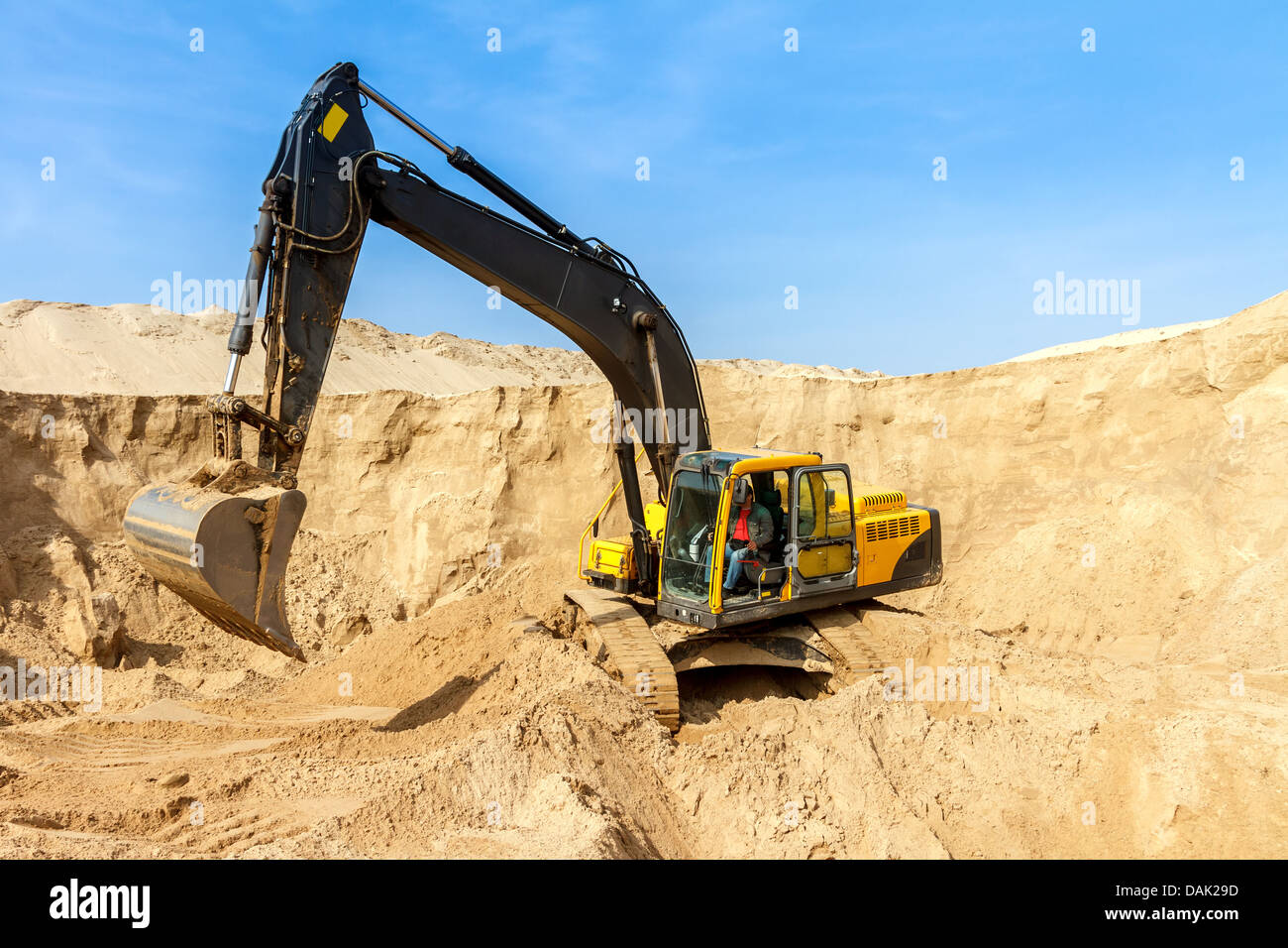 Yellow Excavator work at Construction Site Stock Photo - Alamy