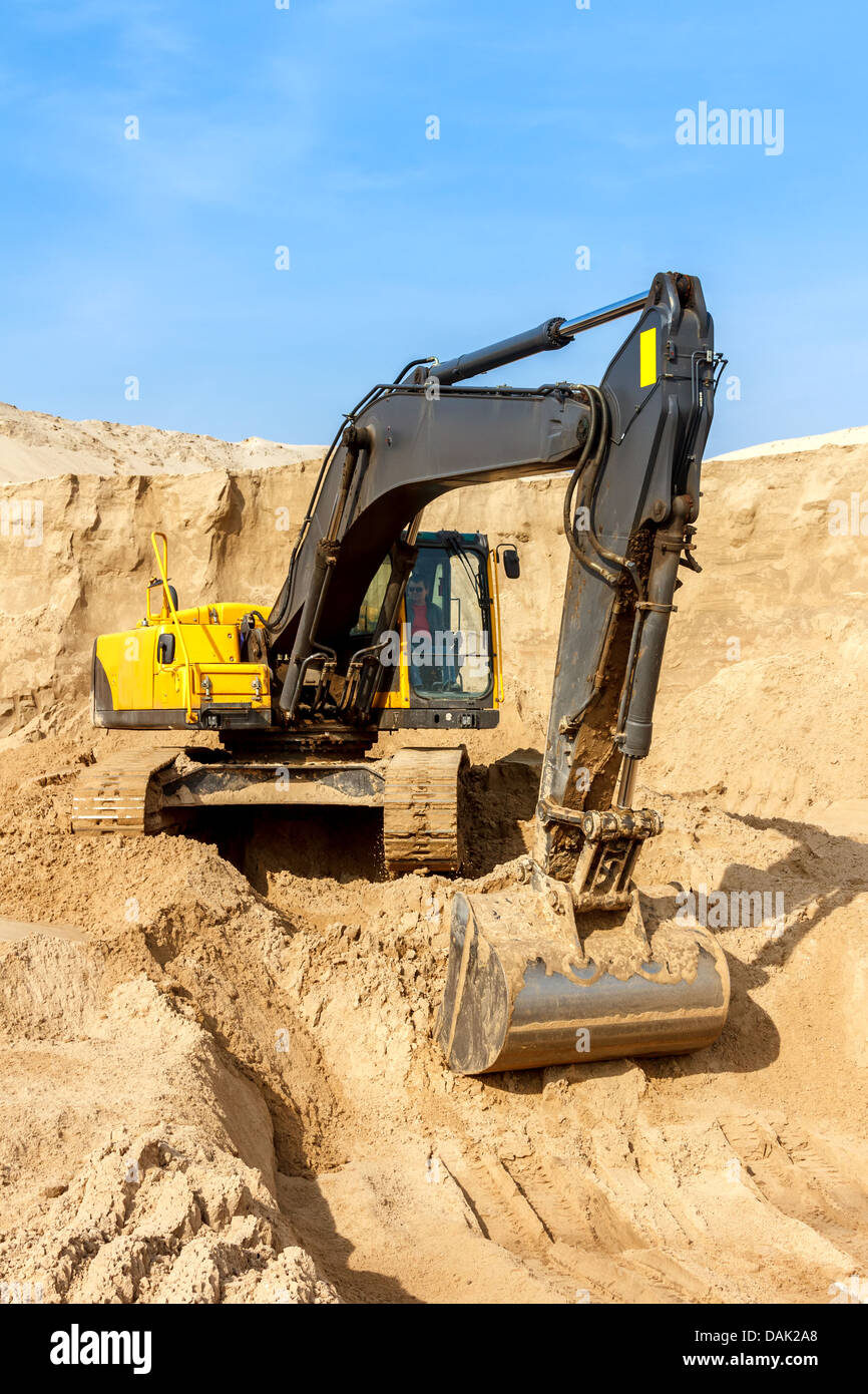 Yellow Excavator work at Construction Site Stock Photo - Alamy