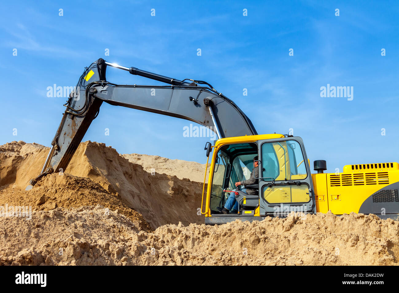 Yellow Excavator work at Construction Site Stock Photo - Alamy