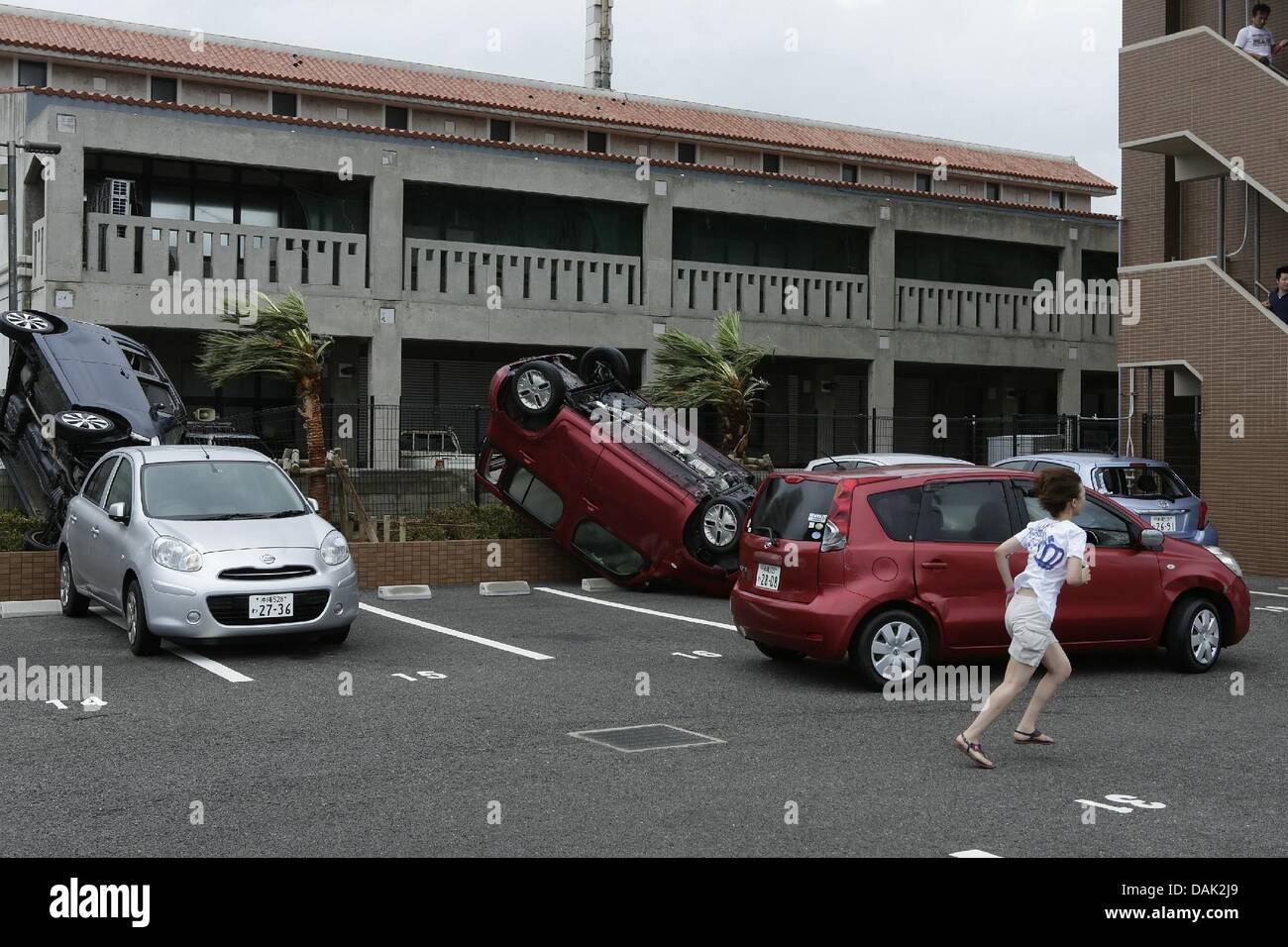 July 13, 2013, Ishigaki, Okinawa, Japan Cars are damaged by typhoon