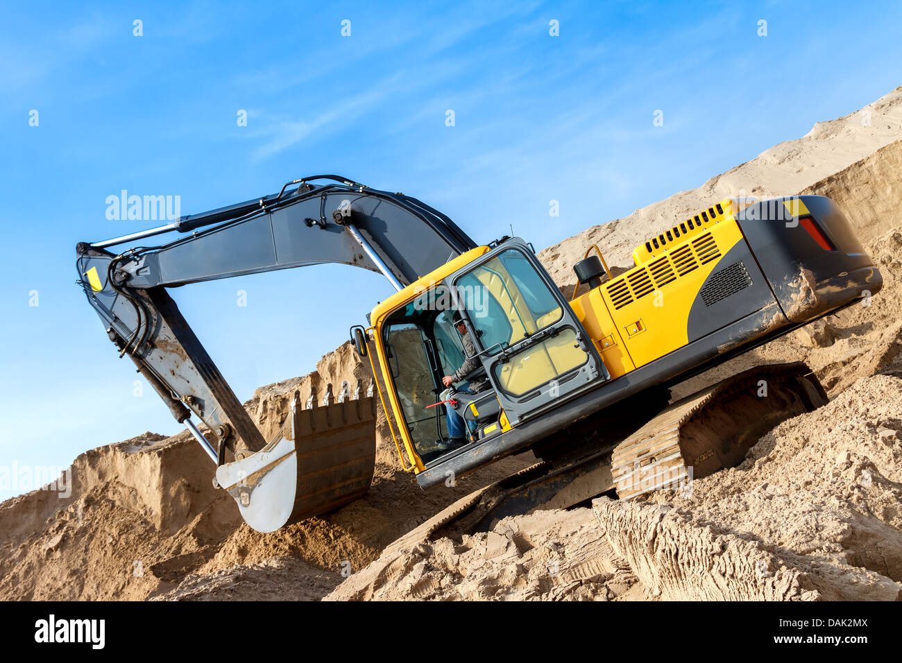 Yellow Excavator work at Construction Site Stock Photo - Alamy