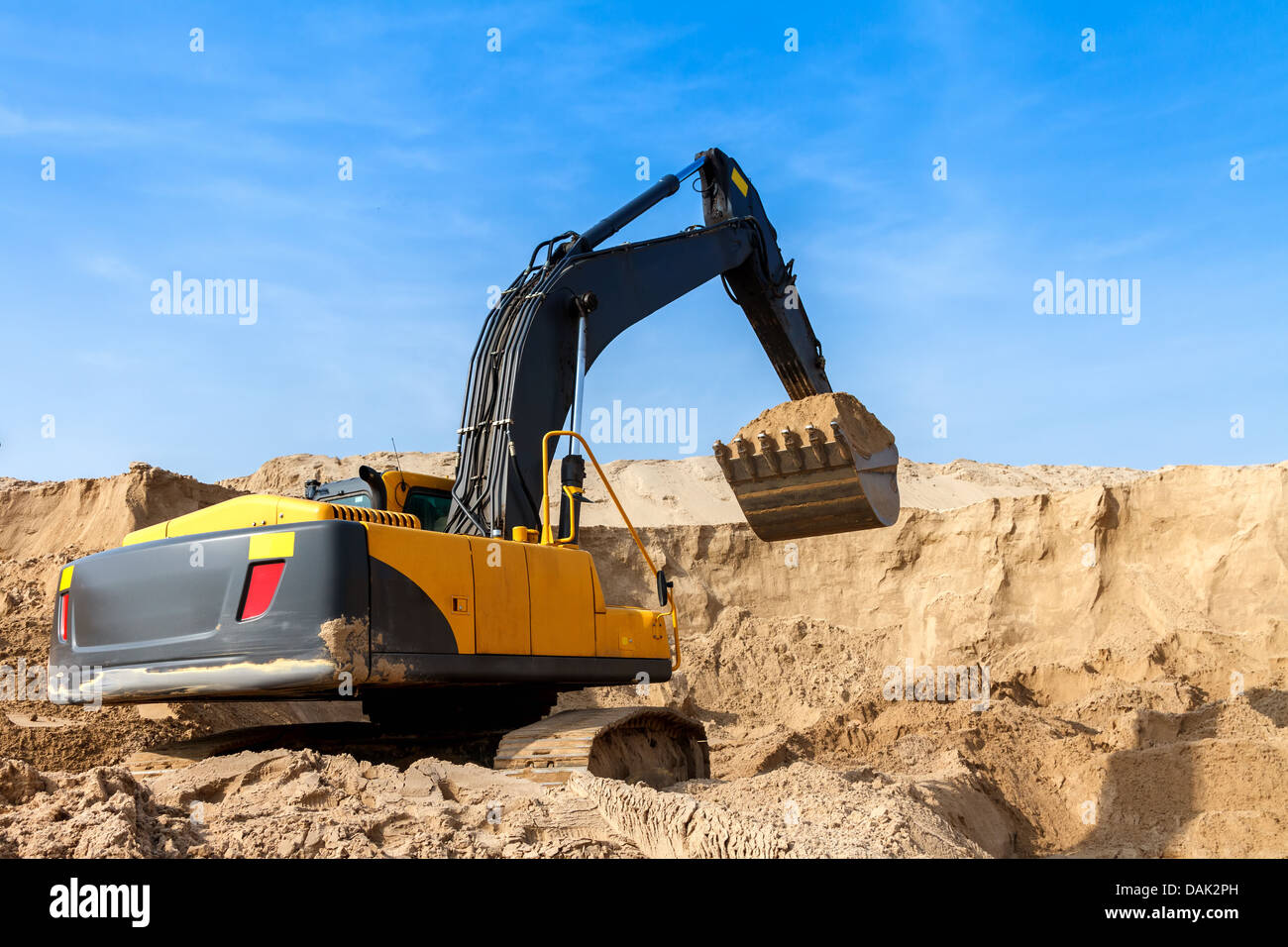 Yellow Excavator work at Construction Site Stock Photo - Alamy