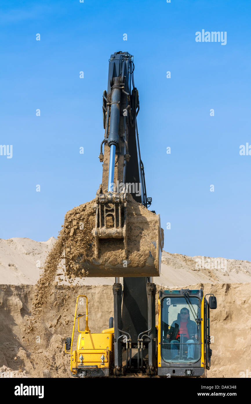 Yellow Excavator work at Construction Site Stock Photo - Alamy