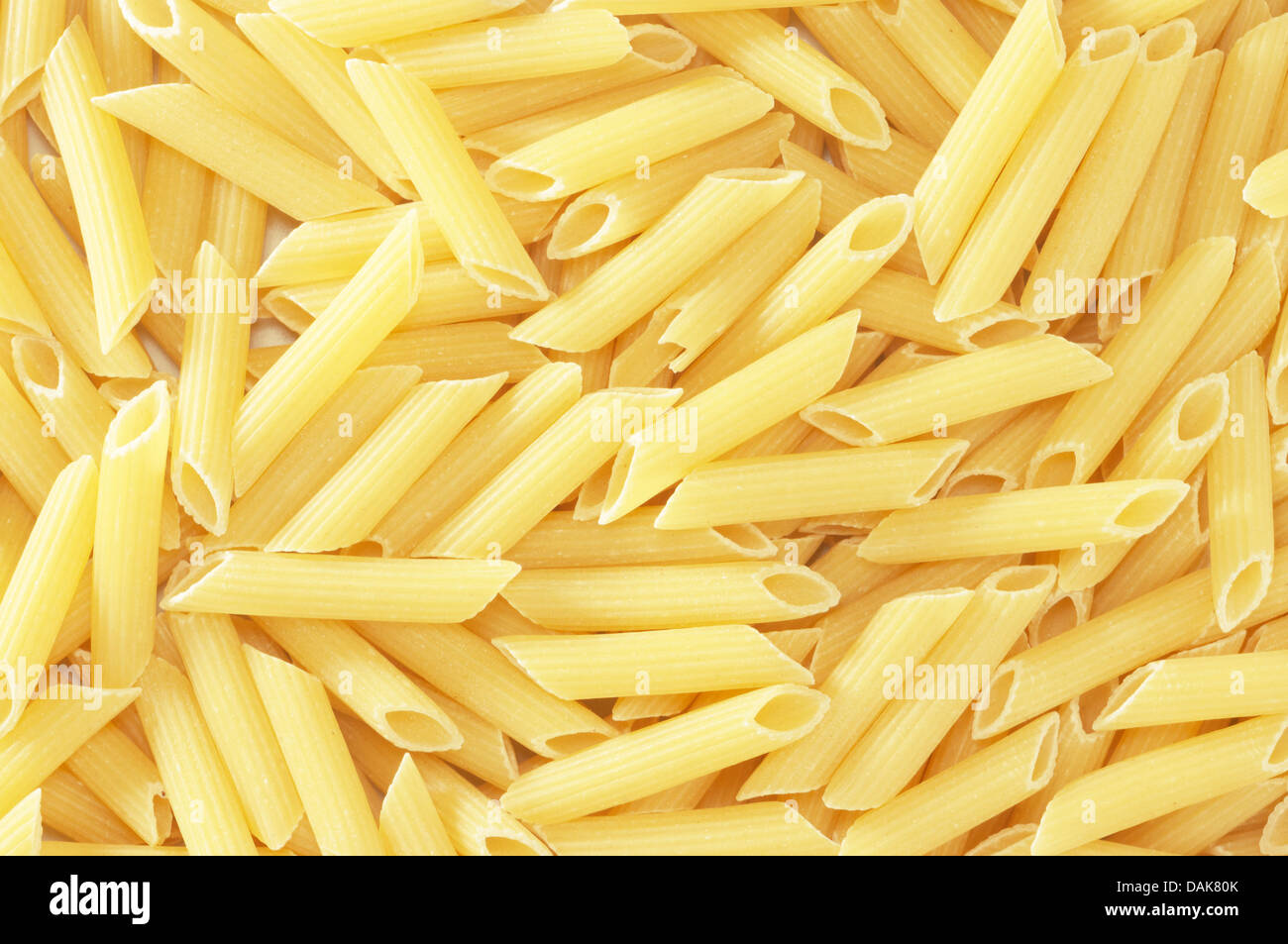background with closeup of macaroni pasta Stock Photo