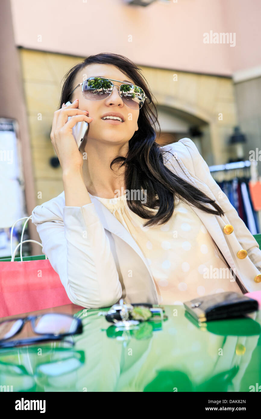 portrait of a young woman in the street cafe Stock Photo - Alamy