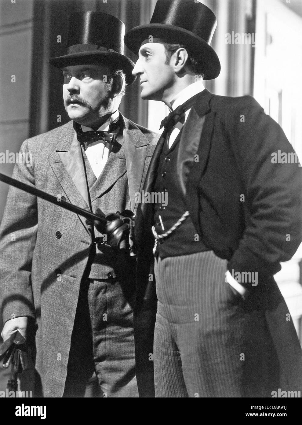 THE HOUND OF THE BASKERVILLES 1939 20th Century Fox film with Basil Rathbone (right) as Holmes and Nigel Bruce as Dr. Watson Stock Photo