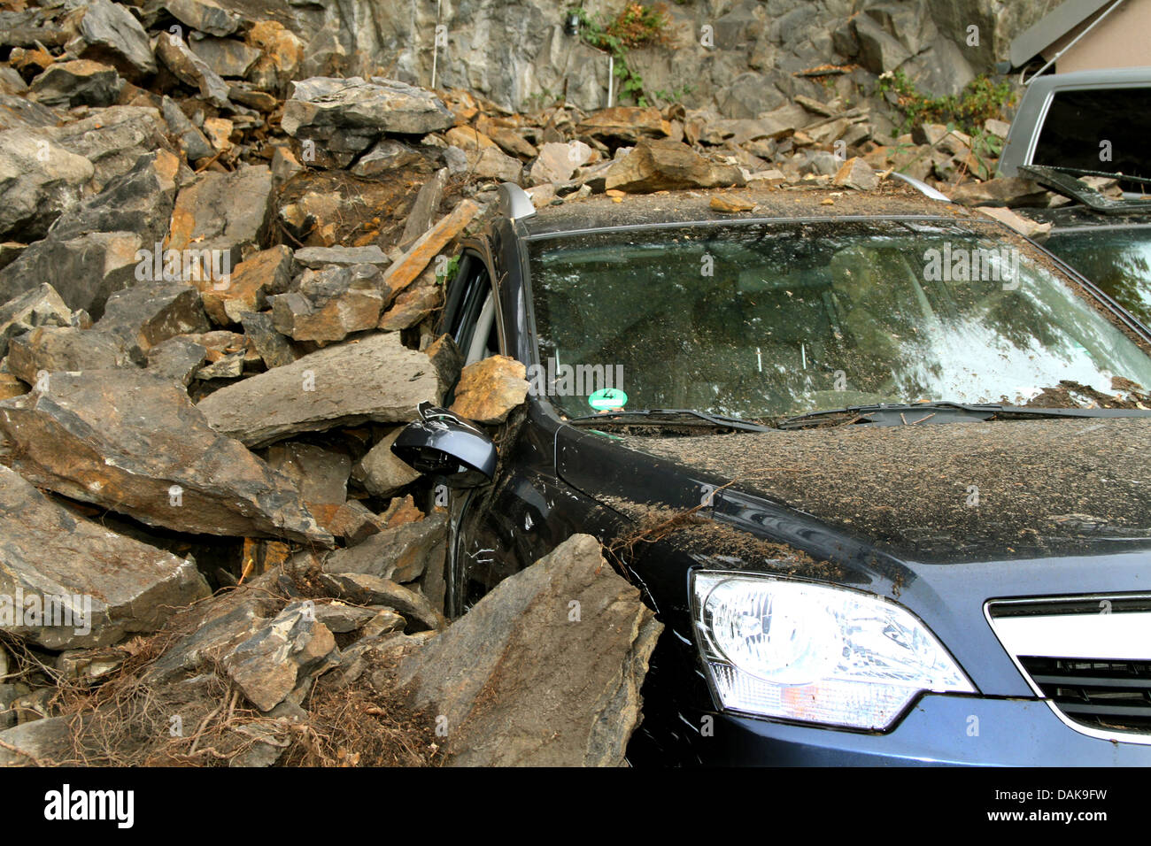 total loss of a car by a rock braking off, Germany Stock Photo