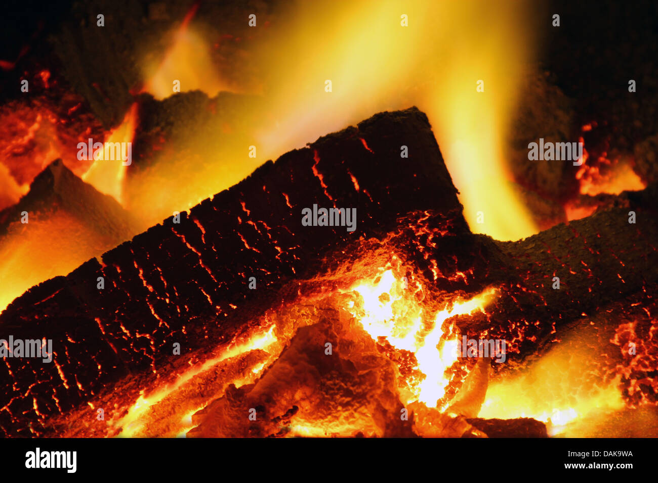 burning lignite briquettes in an oven Stock Photo