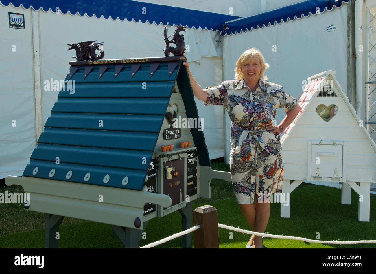 Deborah Meaden poses with her hen house at RHS Hampton court Palace Flower Show 2013 Stock Photo