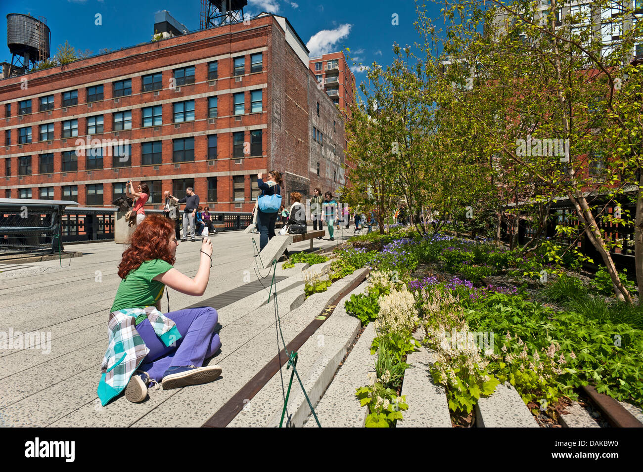 Girl taking a picture High Line Manhattan New York City Stock Photo