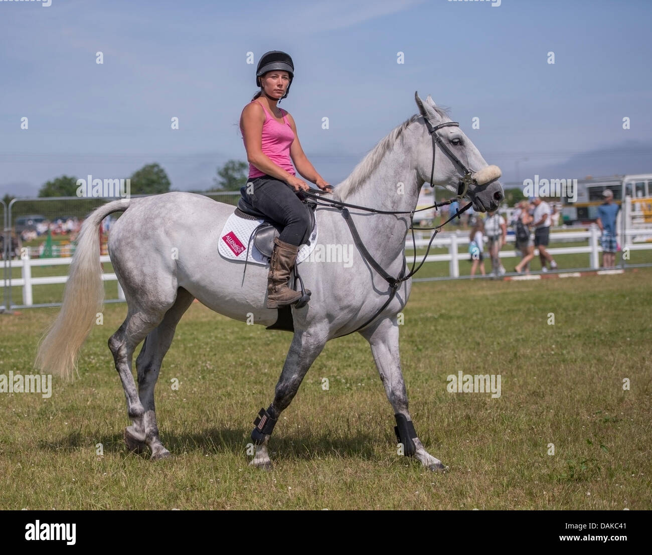 Stithians, UK. 15th July, 2013. Riders prepares her horse for the event at the Stithians show, Cornwall's biggest one day show. Credit:  Bob Sharples/Alamy Live News Stock Photo