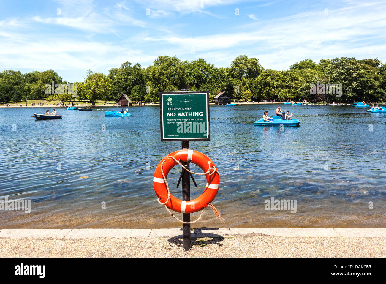 A ring belt on a 'no bathing' upright sign at the Serpentine recreational lake, Hyde Park, London, UK. Stock Photo