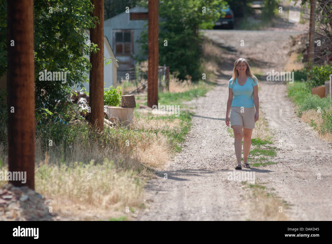 Woman female walking hi-res stock photography and images - Alamy