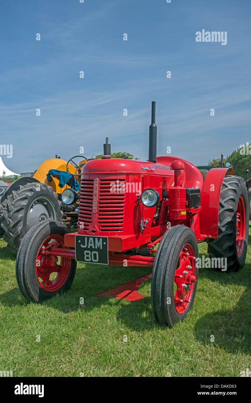 Stithians, UK. 15th July, 2013. Red  Antique Classic Tractor on Show at the Stithians show, Cornwall's biggest one day show. Credit:  Bob Sharples/Alamy Live News Stock Photo