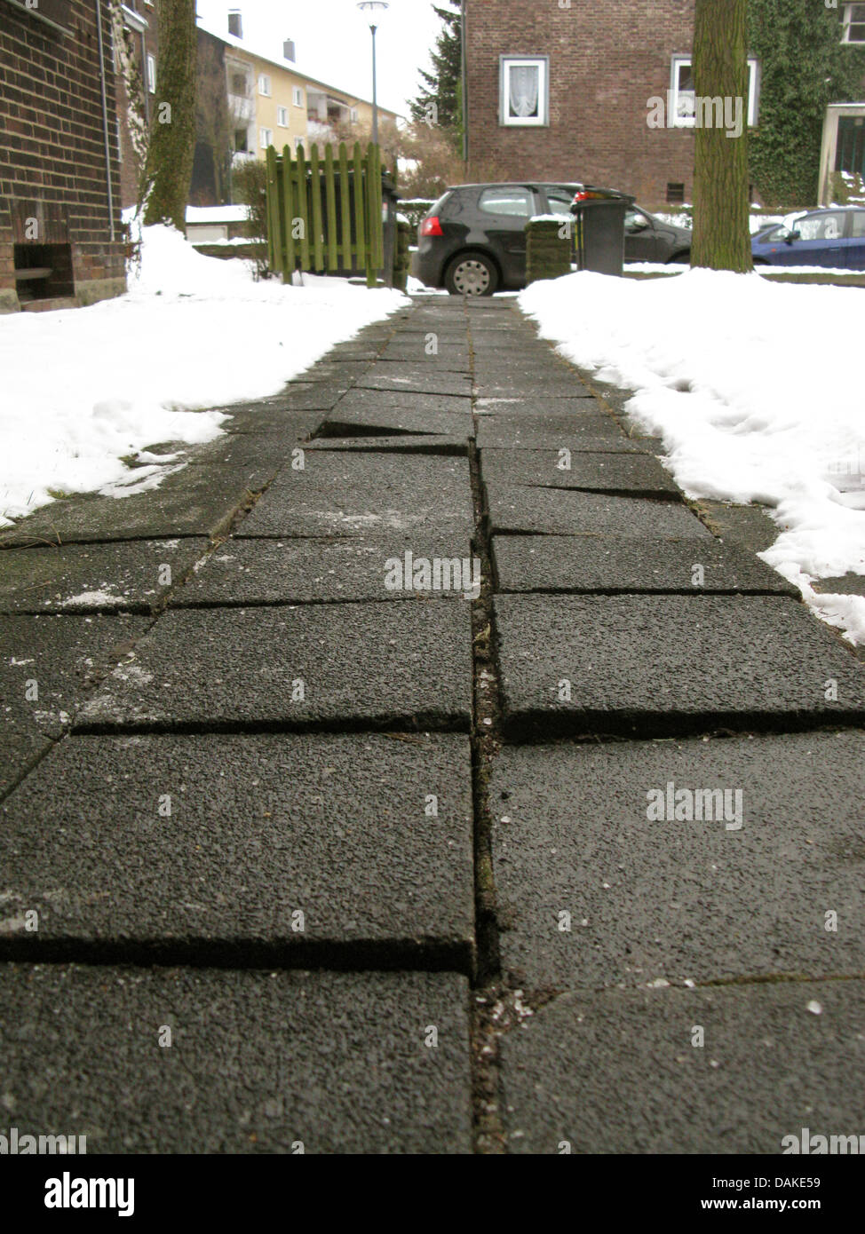 pavement slabs raised by frost, Germany Stock Photo