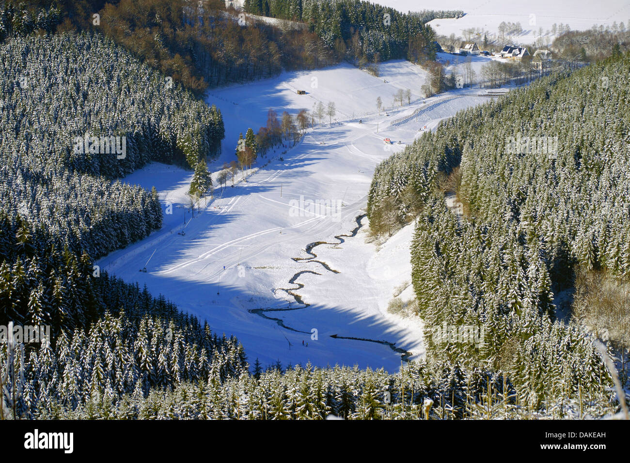 a snow-covered forest and field landscape near Winterberg, Germany, North Rhine-Westphalia, Sauerland Stock Photo