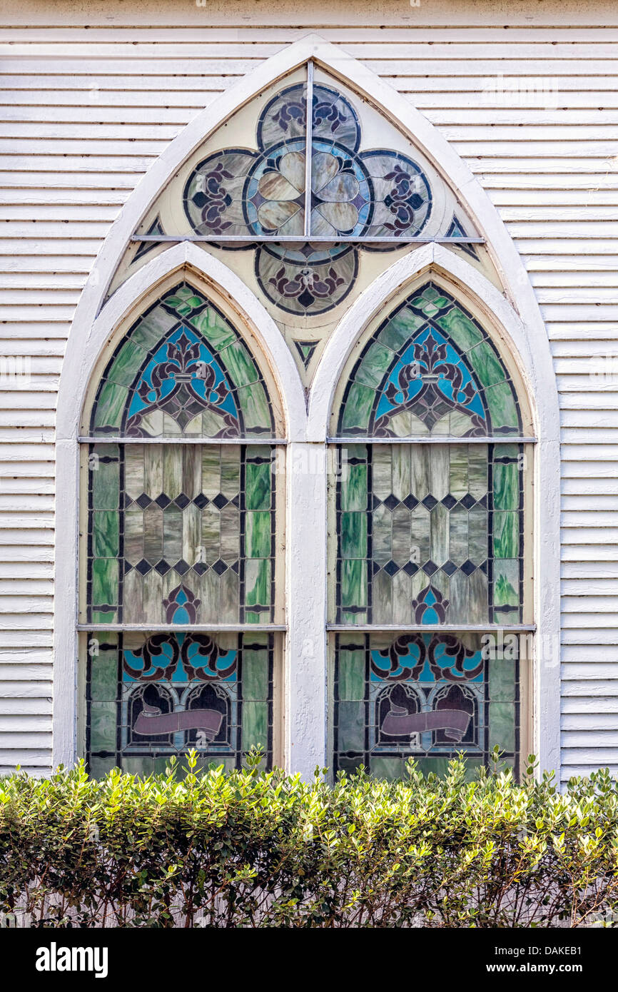 Stained glass gothic arch window in rural historic McIntosh
