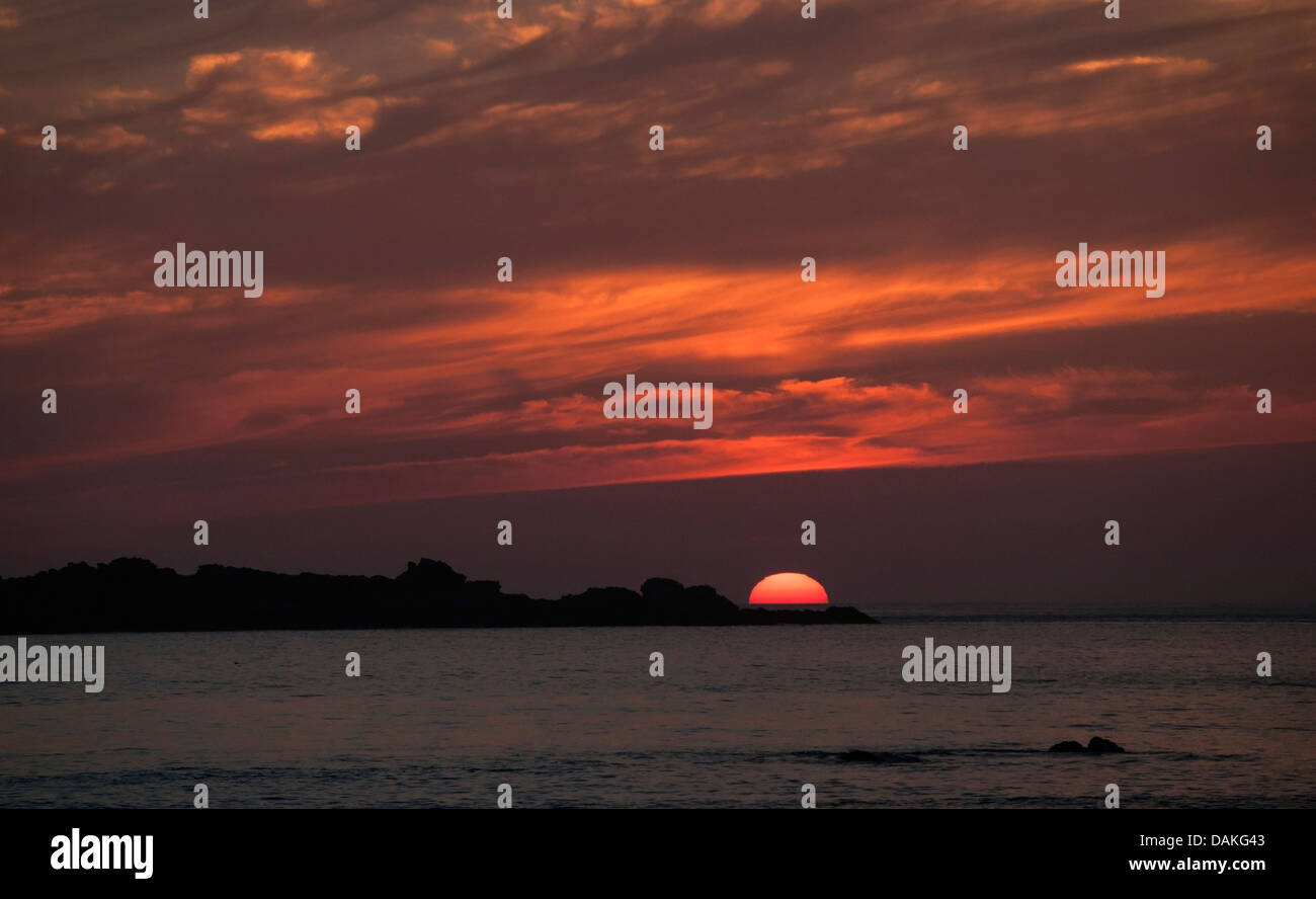 Sun sets on Burhou island, off the Channel Island of Alderney Stock Photo