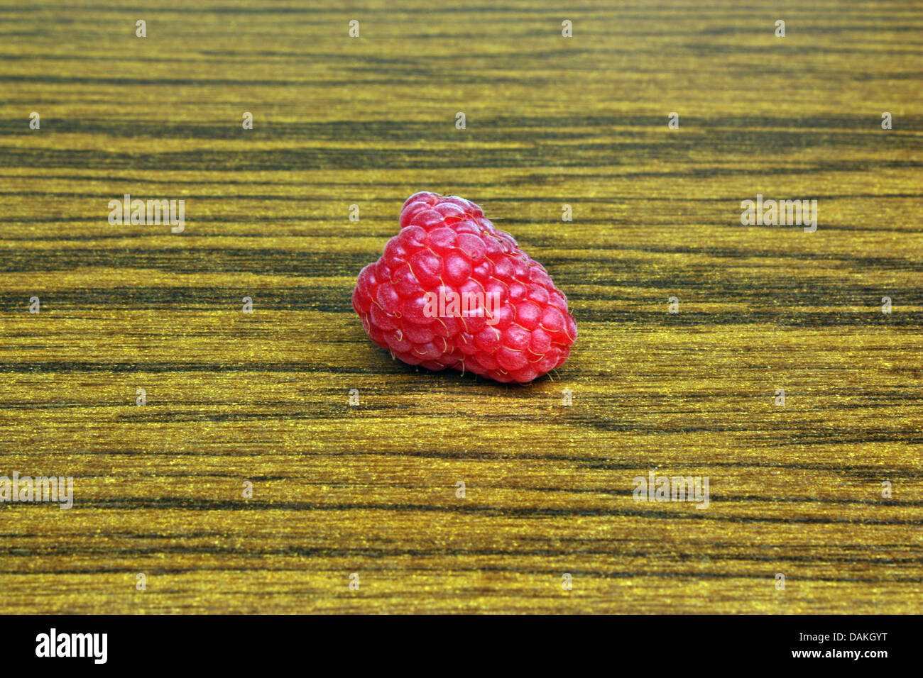 One Raspberry On A Table Raspberries on the table Stock Photo - Alamy