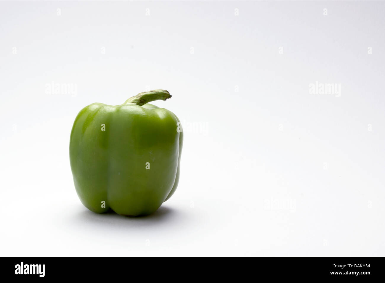 Green Pepper on a white background Stock Photo - Alamy