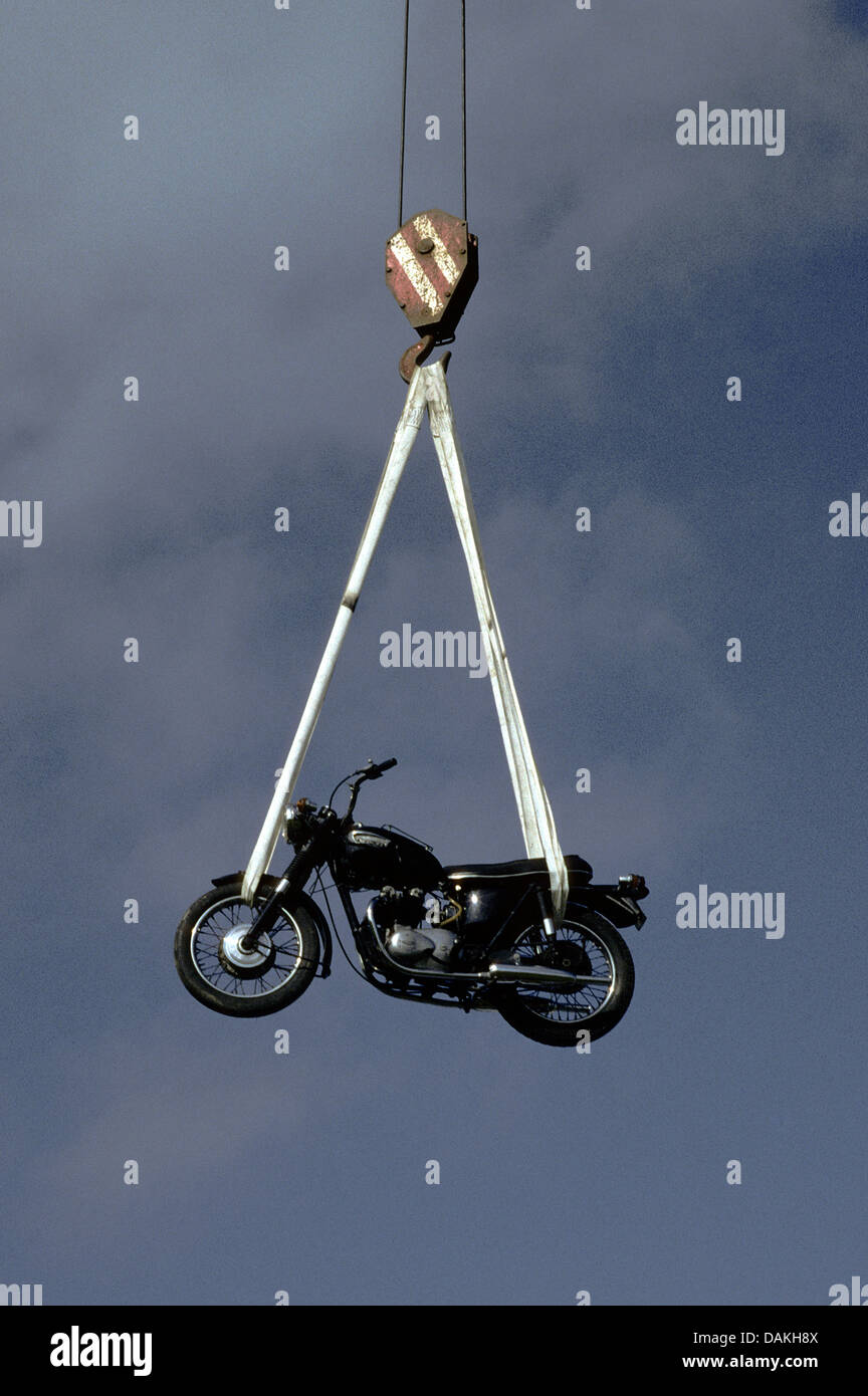 Triumph motorbike hanging from crane at bike festival in Kilmeaden